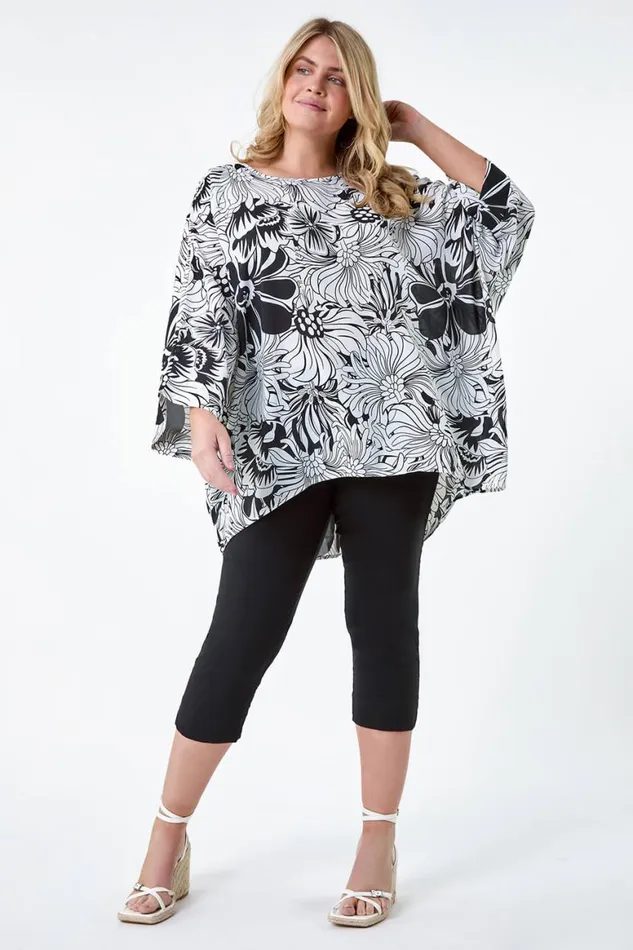 Women Black Curve Floral Print Dipped Hem Top Roman Tops
