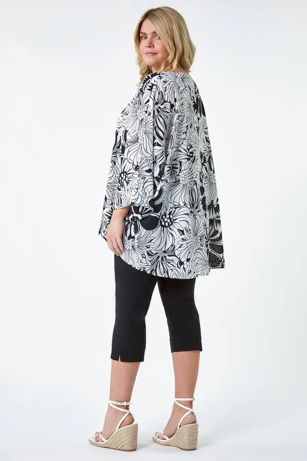 Women Black Curve Floral Print Dipped Hem Top Roman Tops