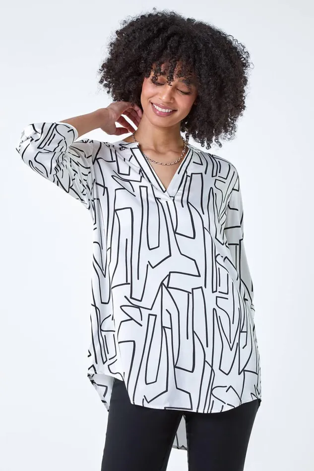 Women Ivory Abstract Print Longline VNeck Top Roman Tops
