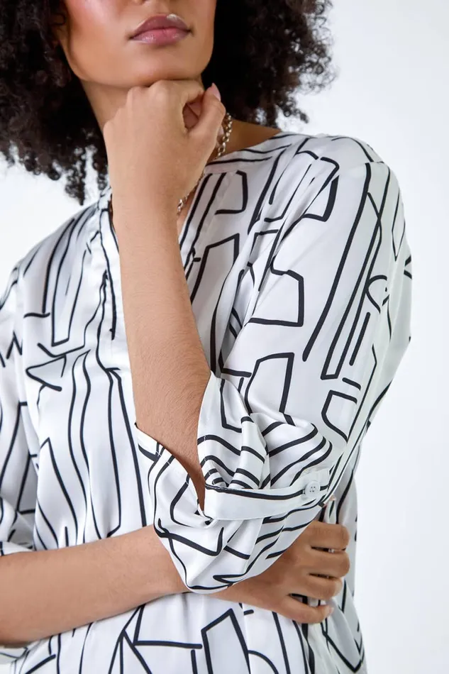 Women Ivory Abstract Print Longline VNeck Top Roman Tops