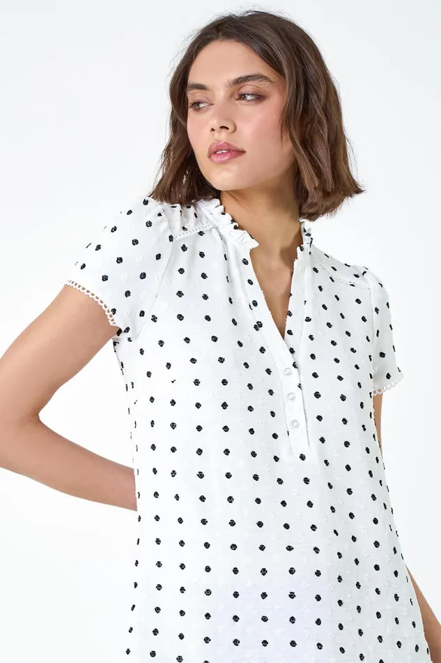 Women Ivory Textured Spot Print Ruffle Detail Top Roman Tops