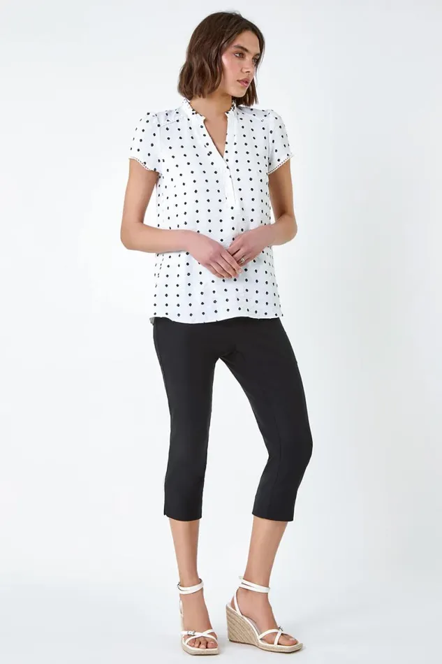 Women Ivory Textured Spot Print Ruffle Detail Top Roman Tops