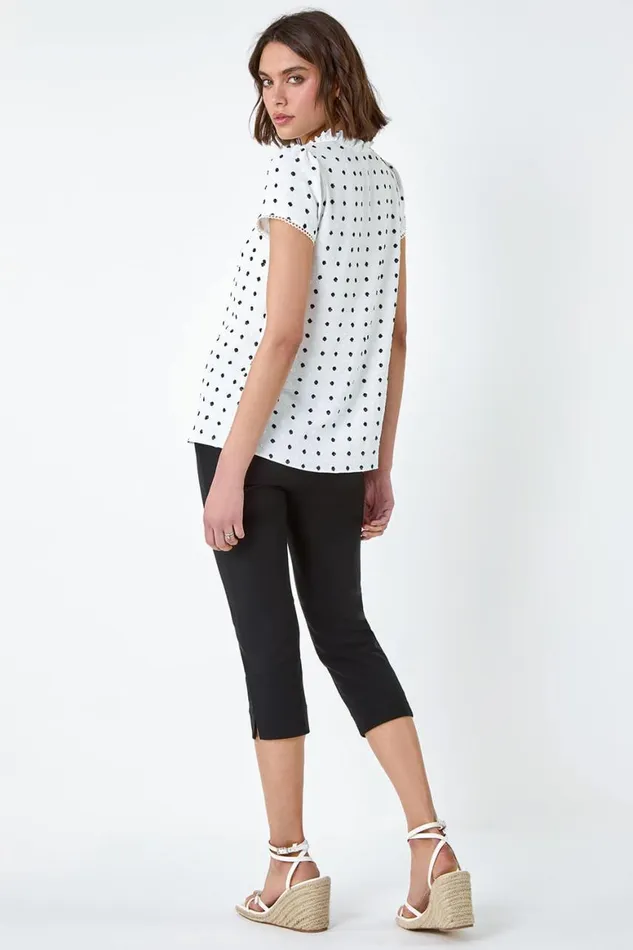 Women Ivory Textured Spot Print Ruffle Detail Top Roman Tops