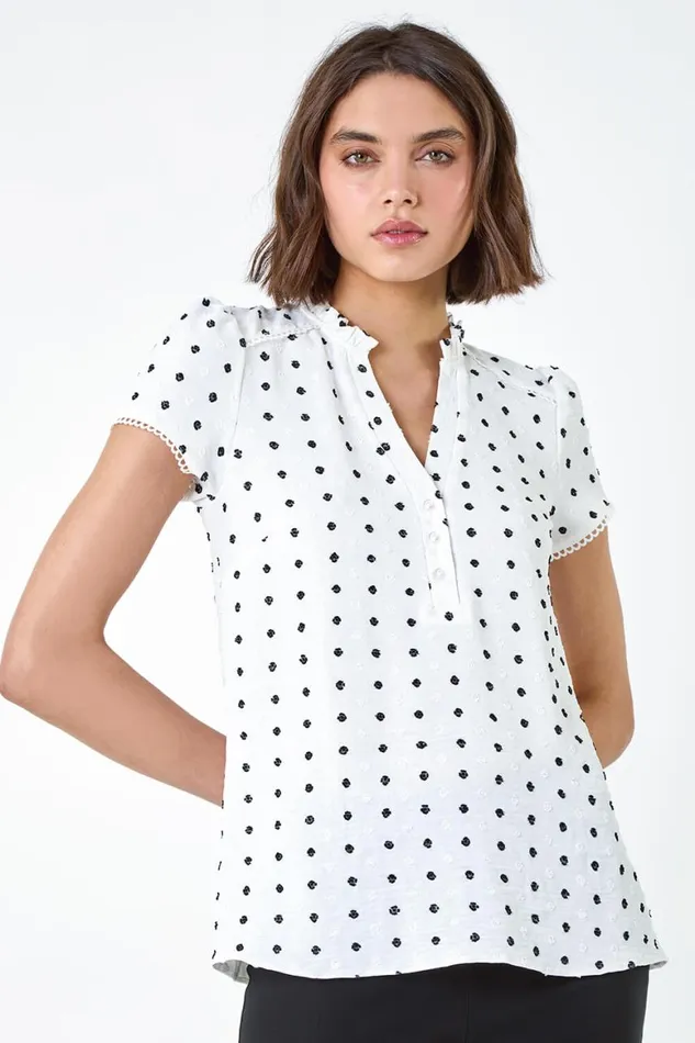 Women Ivory Textured Spot Print Ruffle Detail Top Roman Tops