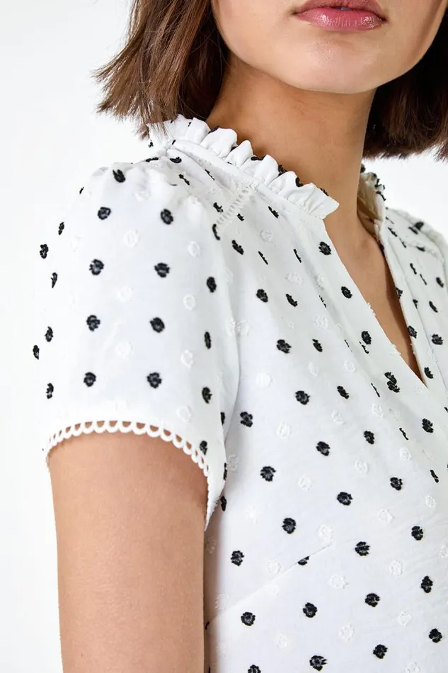 Women Ivory Textured Spot Print Ruffle Detail Top Roman Tops