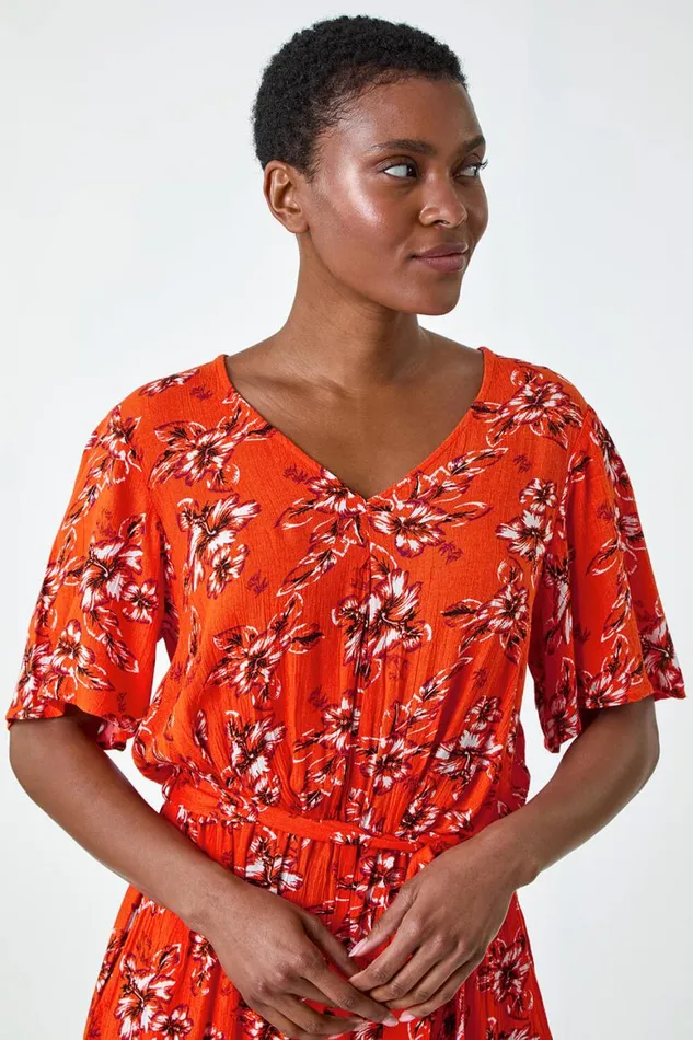 Women Orange Floral Print Pocket Detail Belted Playsuit Roman Dresses