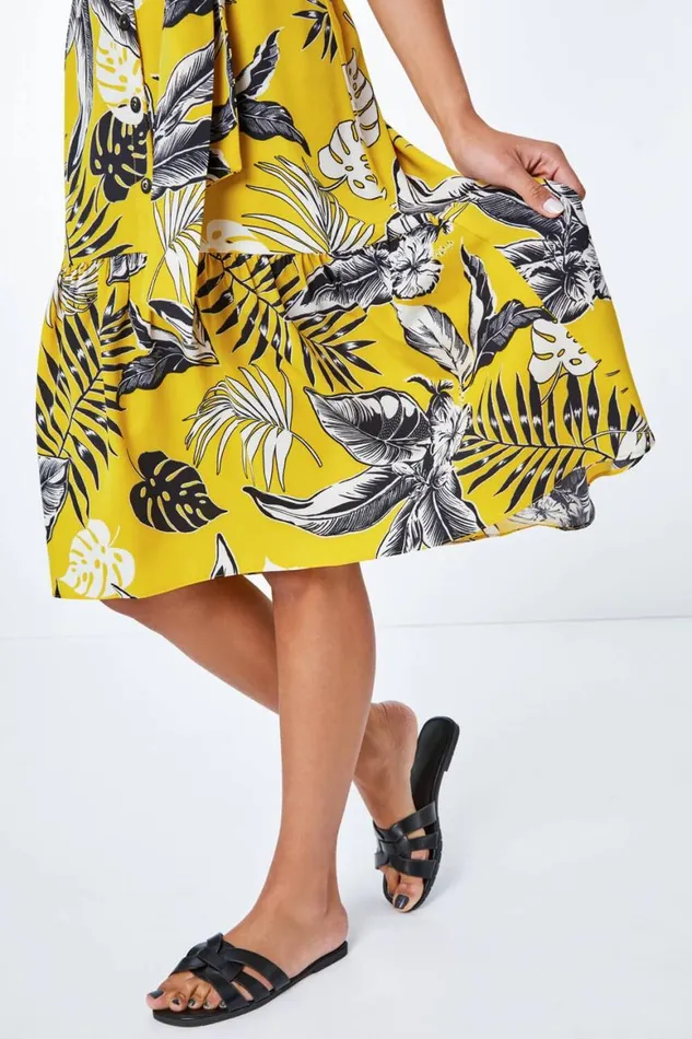 Women Yellow Tropical Print Dipped Hem Dress Roman Dresses